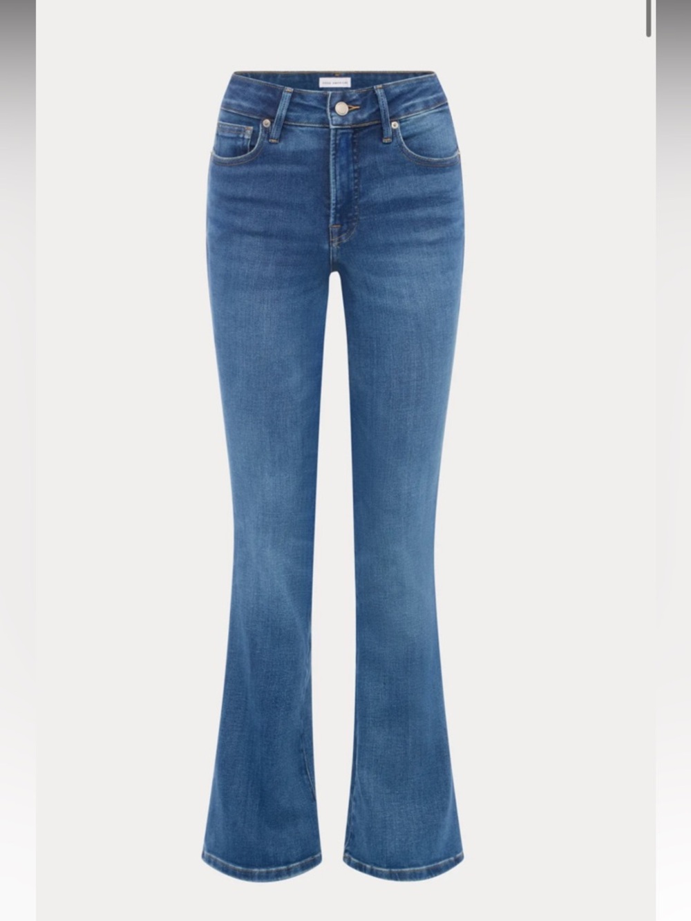 Good American classic bootcut jeans with raw hem